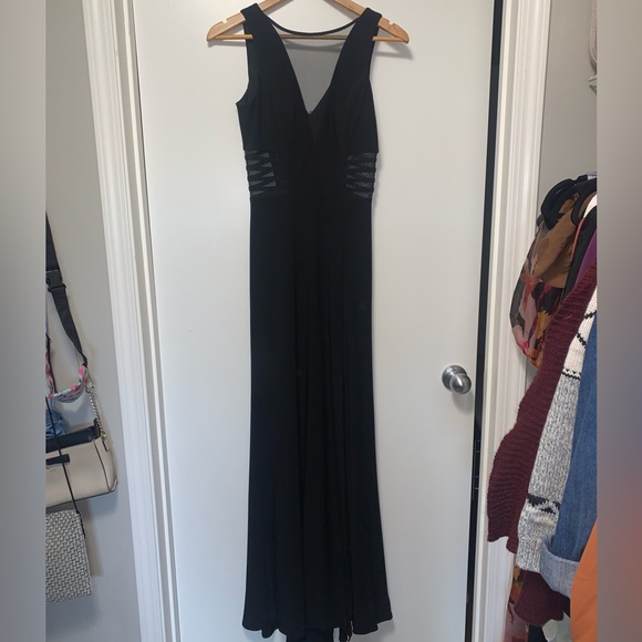 Black gown with mesh panelling and slit on left side. - Picture 2 of 3